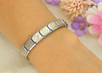 Zawieszka Nomination 'Słońce' 030110 02 z kolekcji Link 18K – stal szlachetna i złoto 18K. Idealny prezent na lato - słońce. Personalizuj bransoletkę Nomination!ad (2).jpg